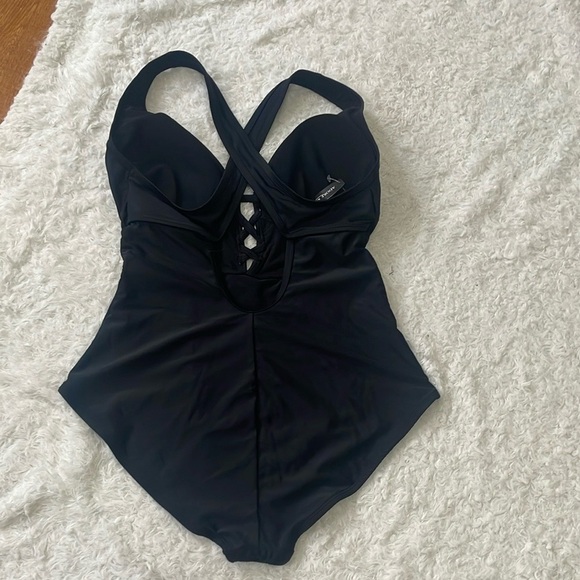 Adore Me Black One-Piece Swimsuit with Plunging V-Neck
Size 1X
Color black 
New - Picture 6 of 8